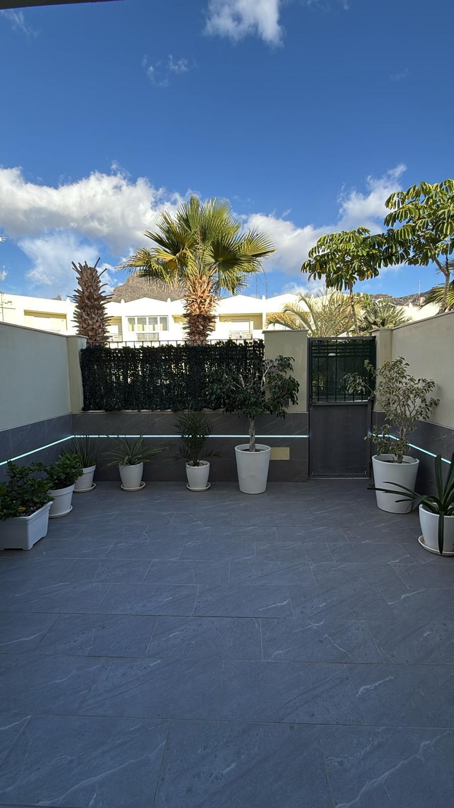Bright townhouse with closed garage and terraces in Costa Adeje